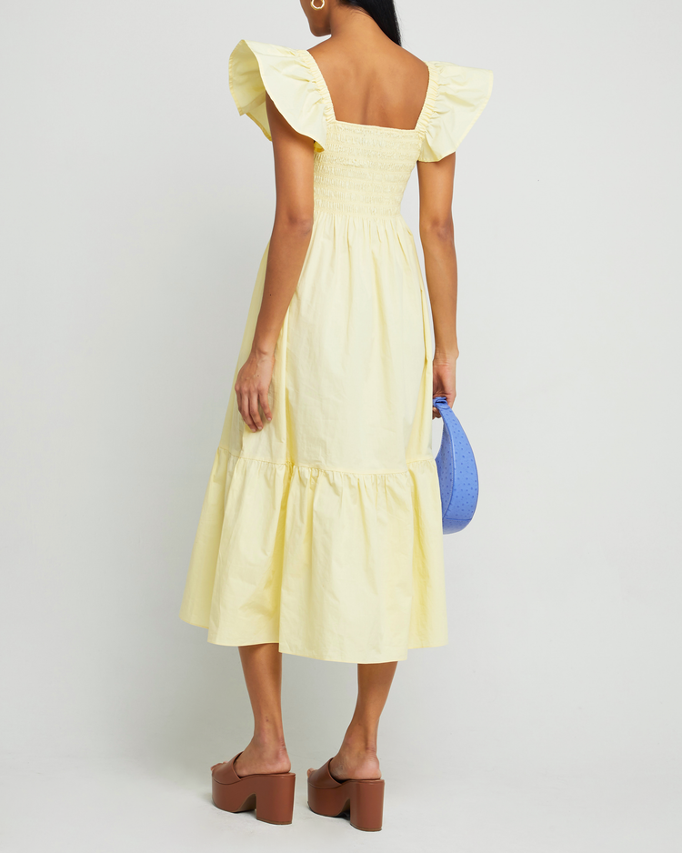 Fifth image of Tuscany Dress, a yellow midi dress, smocked bodice, ruffled cap sleeves, pockets