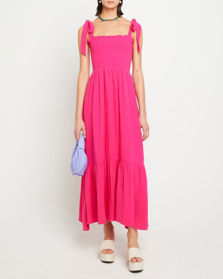 First image of Cotton Winnie Dress, a pink maxi dress, tie straps, smocked bodice