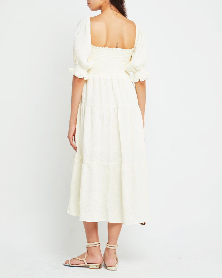 Second image of Frankie Dress, a white midi dress, smocked bodice, short sleeve, puff sleeve