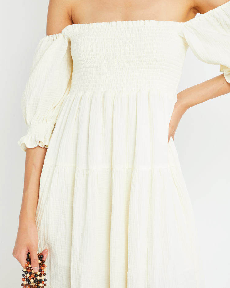 Sixth image of Frankie Dress, a white midi dress, smocked bodice, short sleeve, puff sleeve