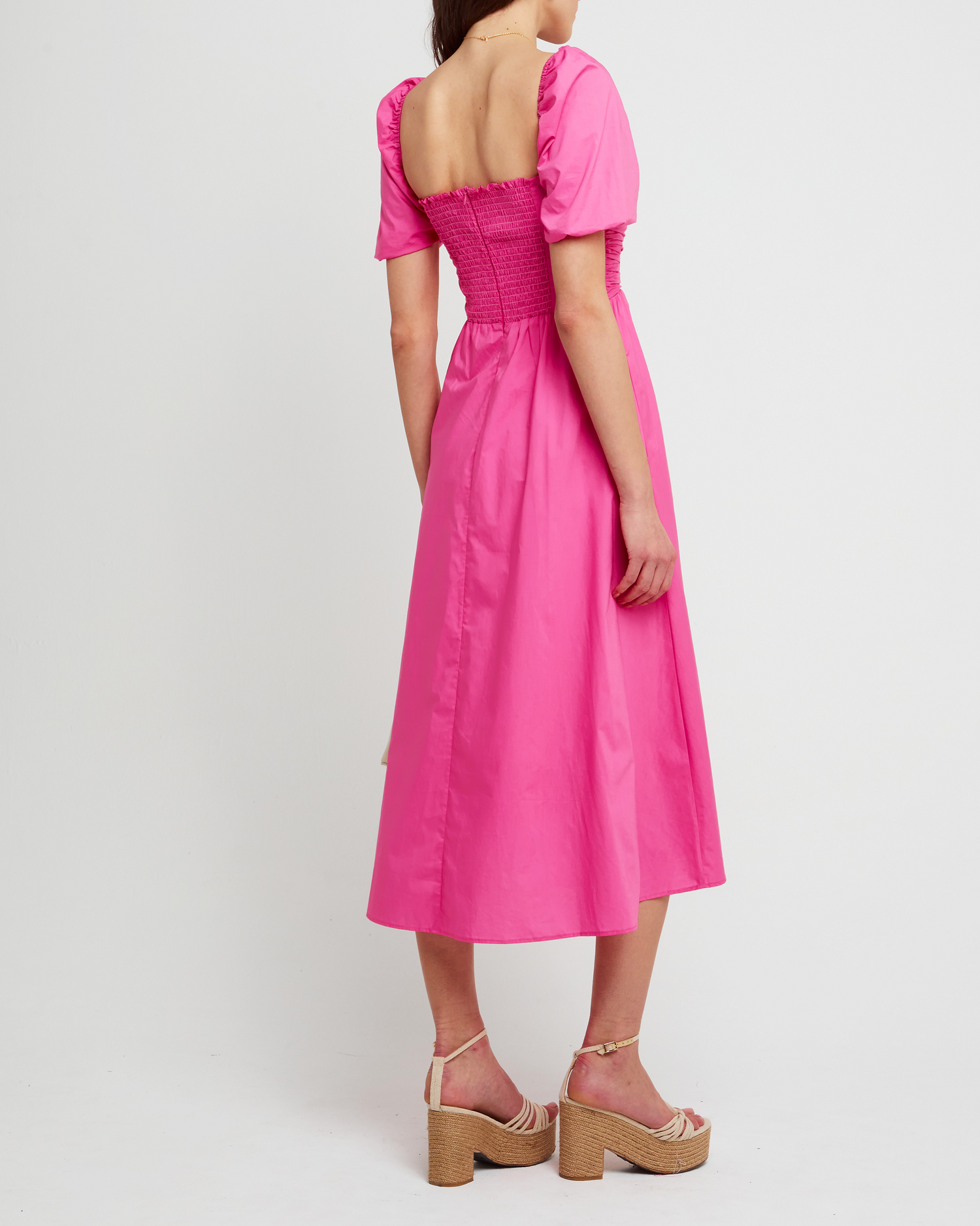 Second image of River Dress, a pink midi dress, square neckline, short puff sleeves, gathered bodice