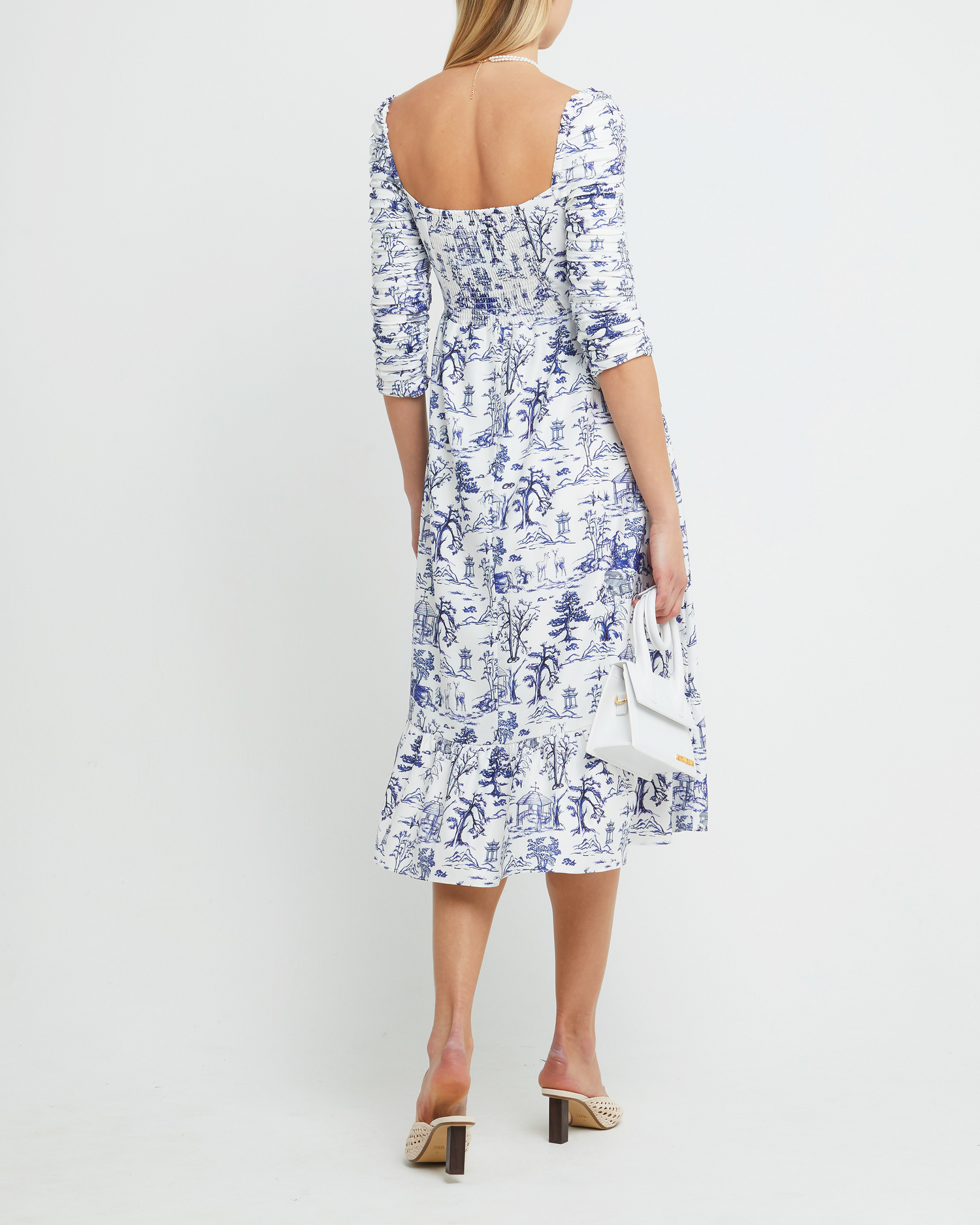 Fifth image of Bonnie Dress, a blue midi dress, toile, pockets, ruched sleeves, square neckline, long sleeves, 3/4 sleeves