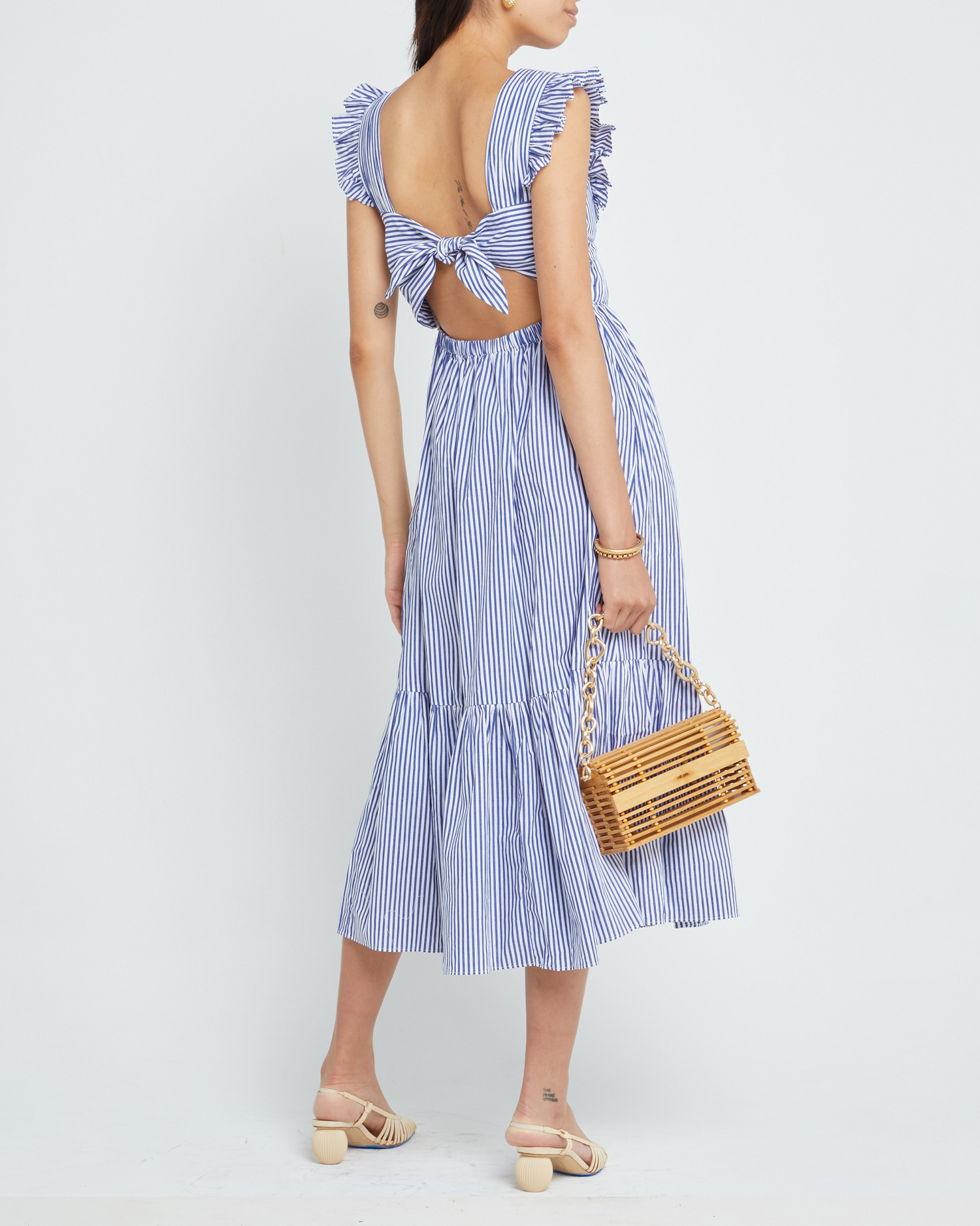 Second image of Stella Dress, a blue midi dress, ruffle sleeves, V-neck, lace, tiered