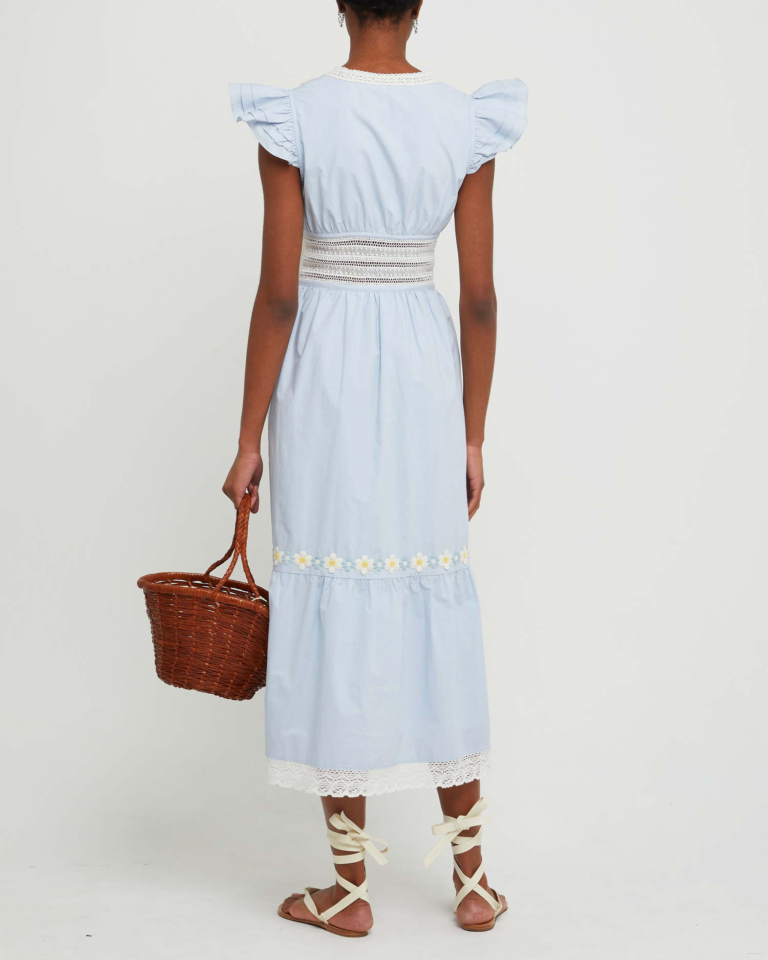 Second image of Holly Cotton Dress, a blue midi dress, lace detail, floral embroidered, pocket, sheer, V-neck