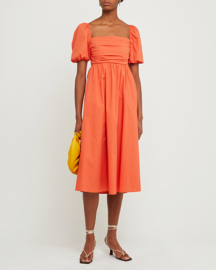 First image of River Dress, a orange midi dress, square neckline, short puff sleeves, gathered bodice