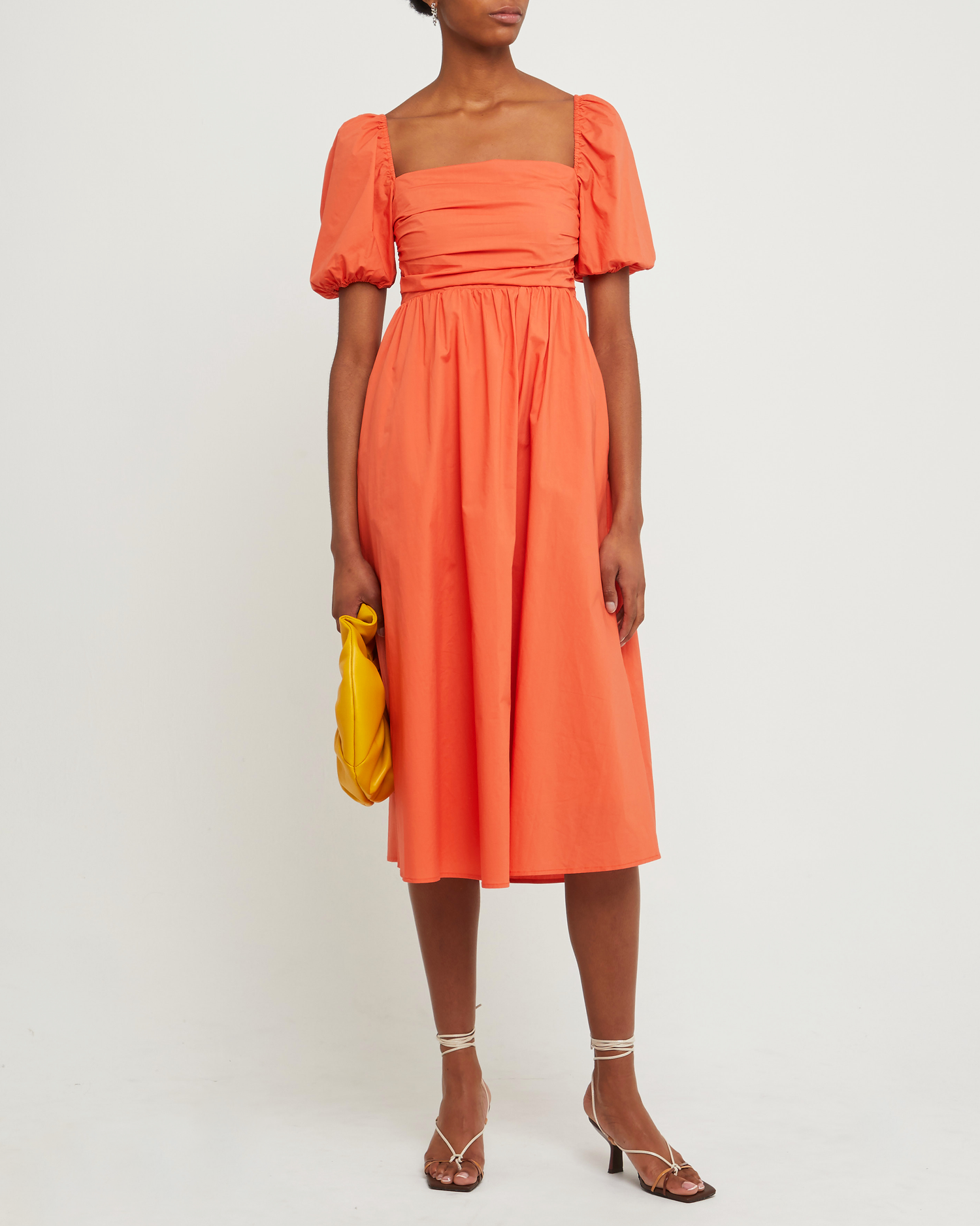 Fourth image of River Dress, a orange midi dress, square neckline, short puff sleeves, gathered bodice