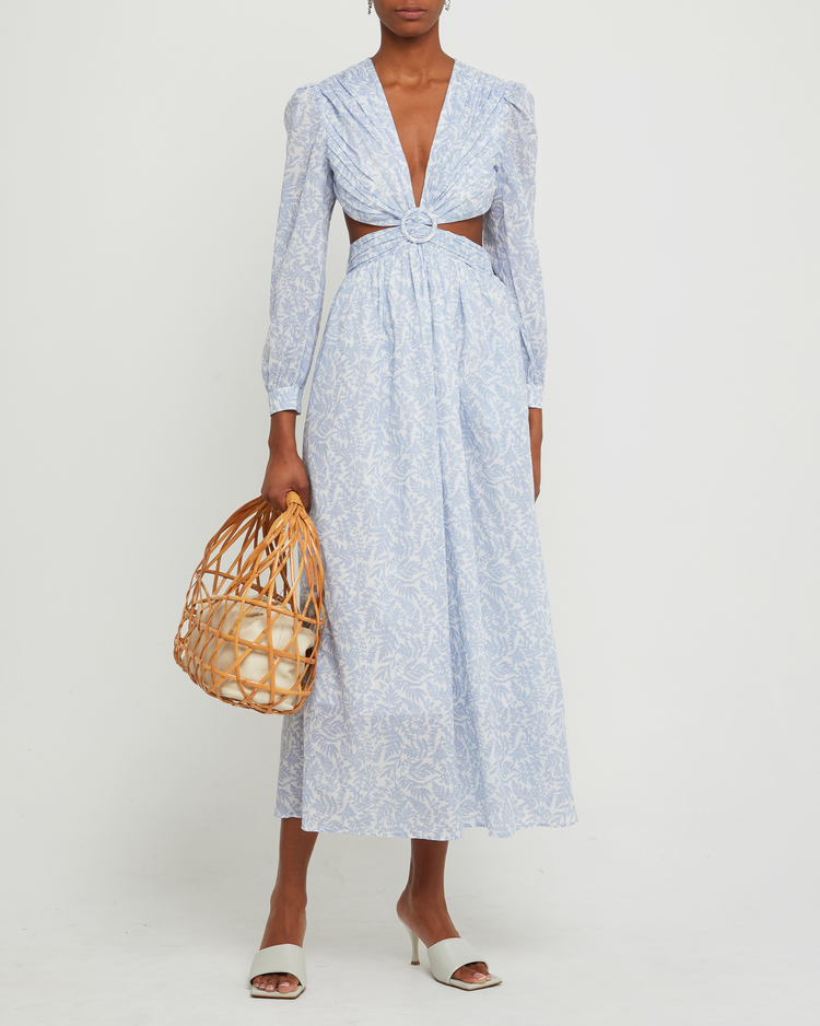 First image of Kimia Cotton Dress, a blue maxi dress, open back, cut outs, V-neck, plunge, floral, long sleeves, puff sleeve