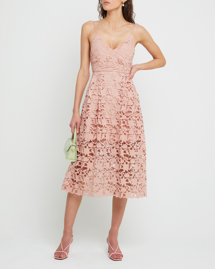 Fourth image of Arabella Dress, a pink modern lace midi-length bridesmaid dress with deep v-neckline, inner lining, adjustable straps, and a back zipper
