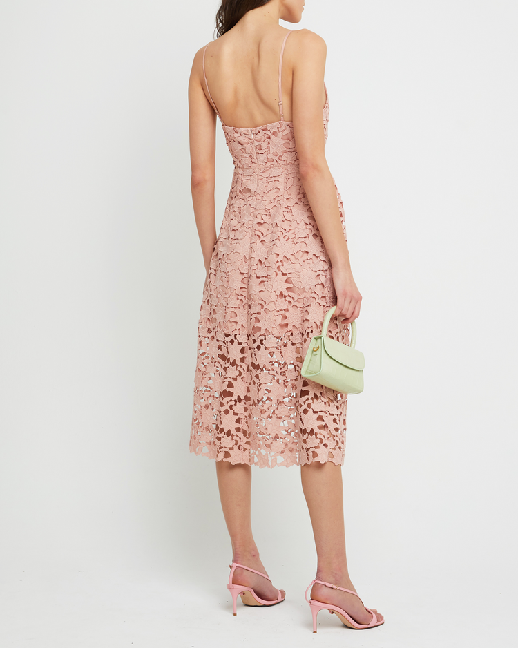 Fifth image of Arabella Dress, a pink modern lace midi-length bridesmaid dress with deep v-neckline, inner lining, adjustable straps, and a back zipper