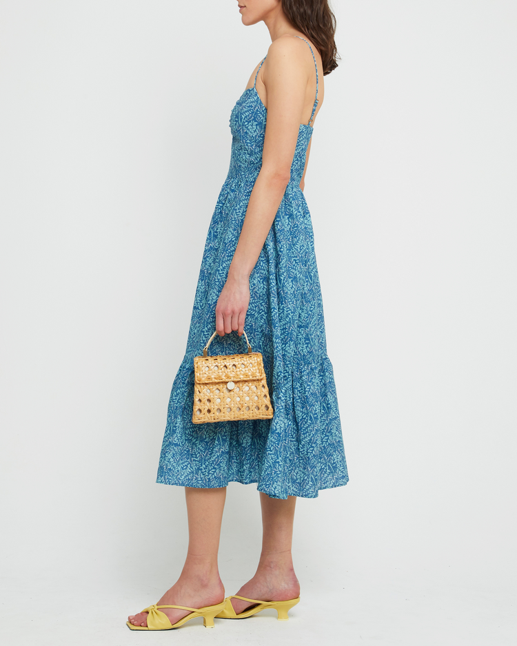 Third image of Momo Dress, a blue midi dress, sweatheart neckline, spaghetti straps, floral