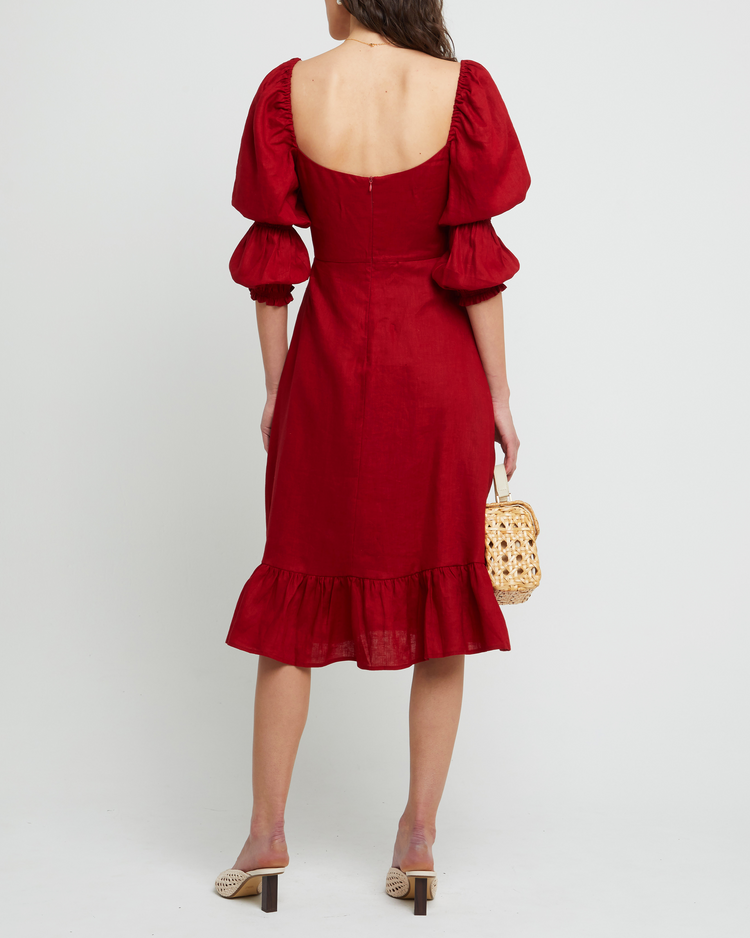 Second image of Kourtney Dress, a red midi dress, puff sleeves, romantic, sweetheart neckline, ruffle skirt