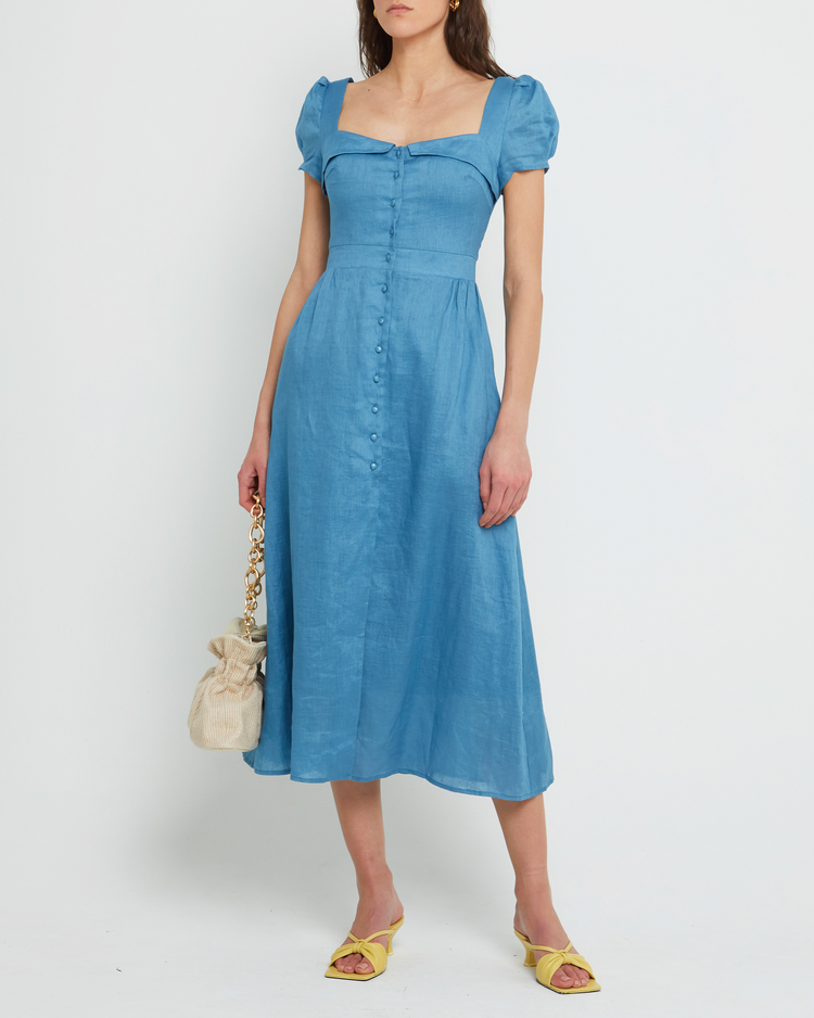 First image of Ryder Dress, a blue maxi dress, button up, bodice detail, short sleeves, cap sleeves