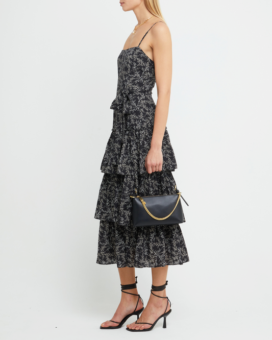 Third image of Nadira Dress, a black midi dress, tiered skirt, floral, spaghetti straps, cami