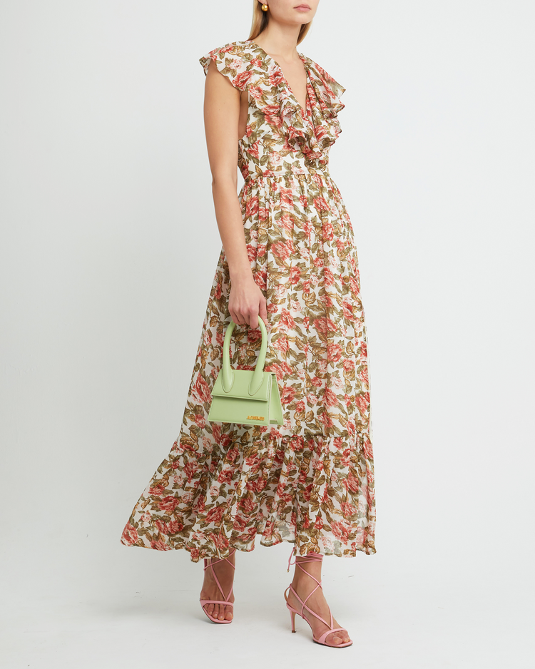 Fourth image of Shea Maxi Dress, a floral wedding guest dress with high side slit, flutter ruffle sleeves, v-neckline, tiered skirt, cinched waistline, side zipper, and lining
