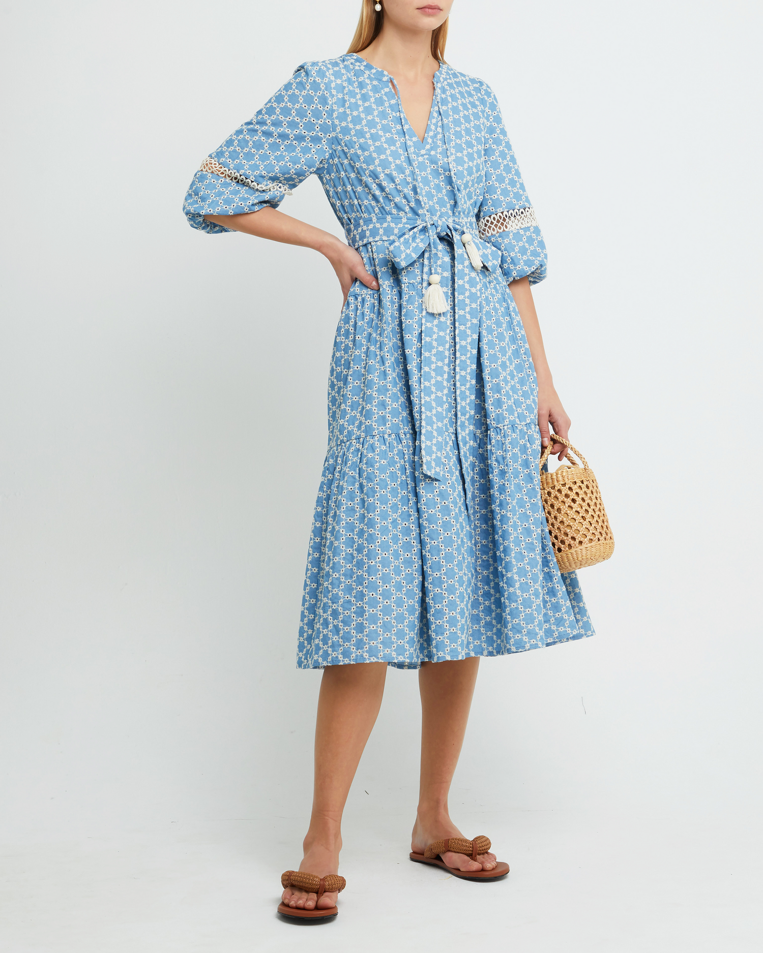 Fourth image of Haven Dress, a blue midi dress, lace detail, eyelet, waist tie, bow, wrap dress, puff sleeves