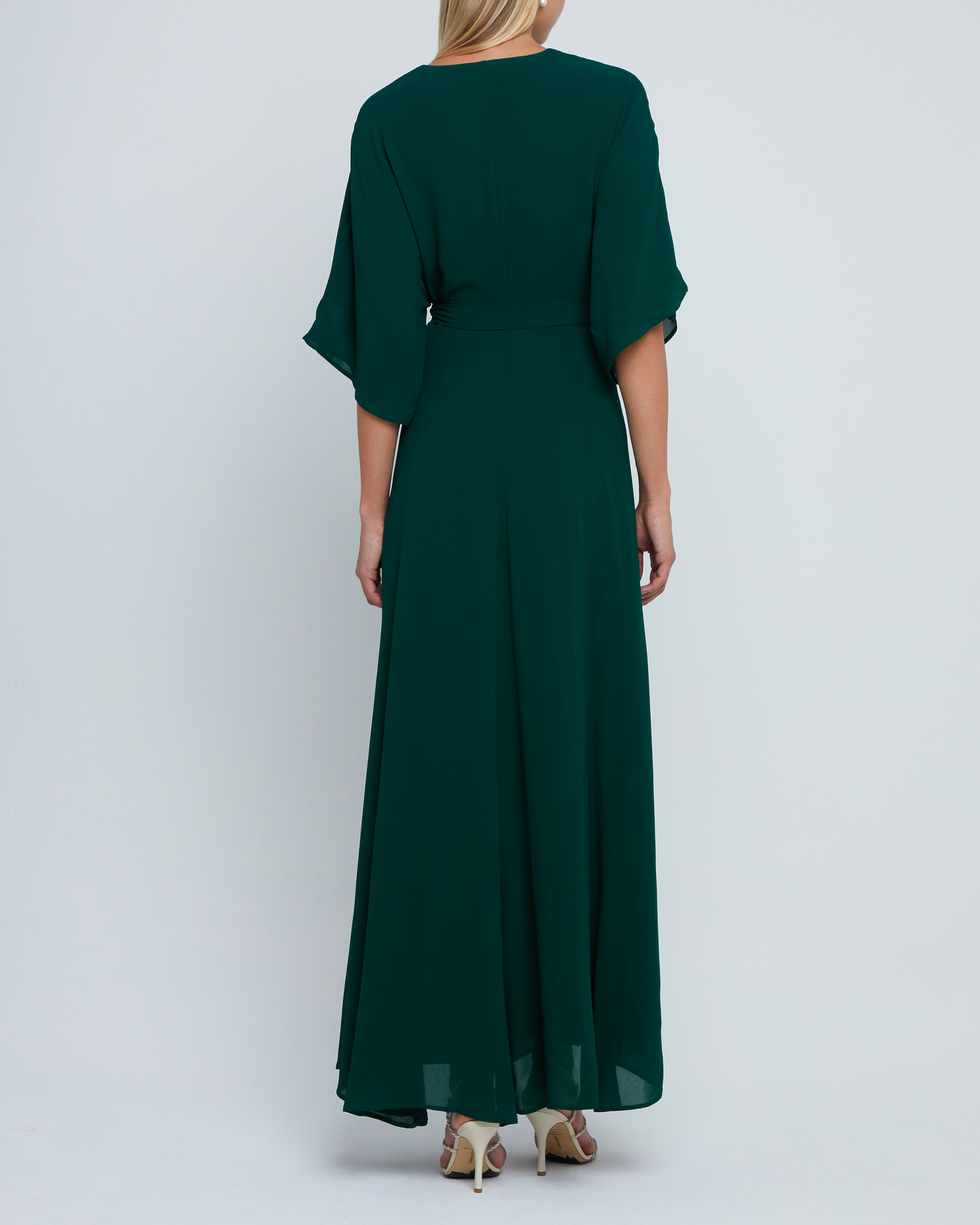 Fourth image of Artie Dress, a green long maxi wrap style bridesmaid dress with flutter sleeves, v-neckline, adjustable waist tie, lining, and dart detail on bodice