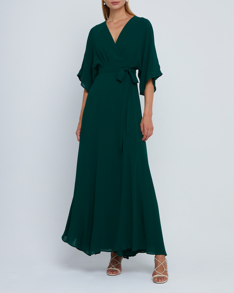 Third image of Artie Dress, a green long maxi wrap style bridesmaid dress with flutter sleeves, v-neckline, adjustable waist tie, lining, and dart detail on bodice