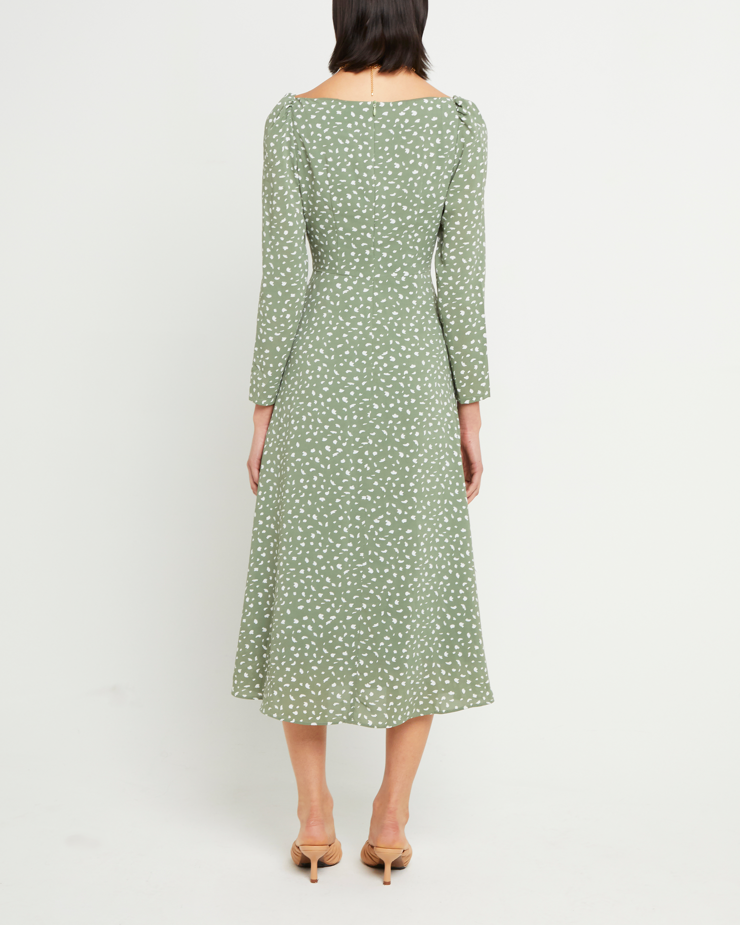 Second image of Crimini Dress, a green midi dress, sweetheart neckline, floral, long sleeves, fitted