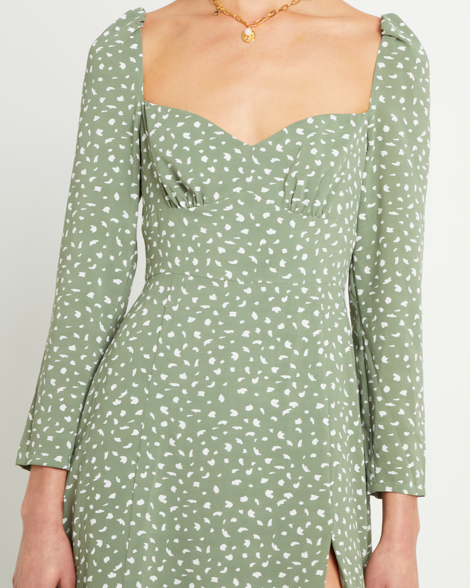 Fifth image of Crimini Dress, a green midi dress, sweetheart neckline, floral, long sleeves, fitted