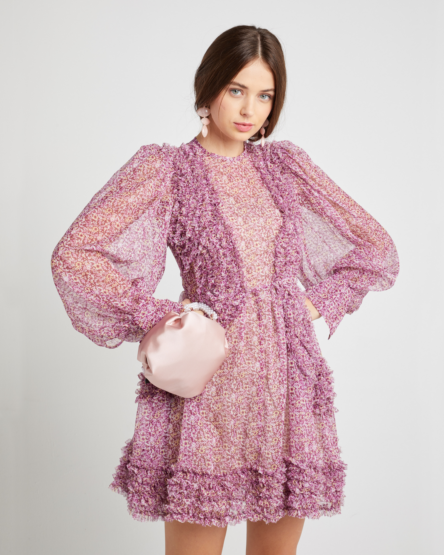 Fifth image of Bessy Dress, a pink mini dress, sheer and floral printed chiffon, ruffled details on bodice and skirt, long, loose puff sleeves