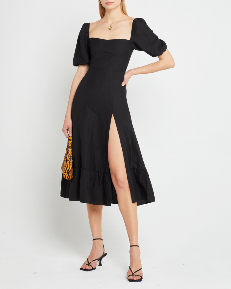 Sixth image of Violetta Midi Dress, a black midi dress, sweetheart neckline, short sleeves, puff sleeves, side slit